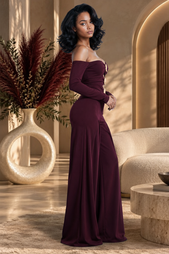 Bleu Hanger burgundy off-the-shoulder jumpsuit with gold hardware, sweetheart neckline, and ruched bodice detail.