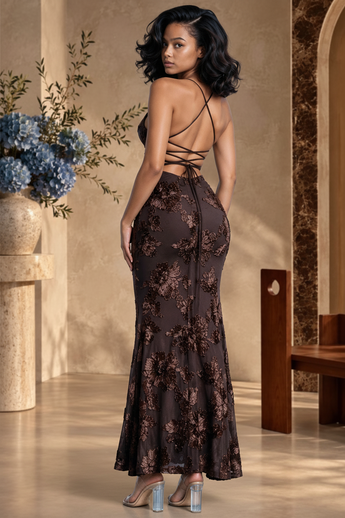 Bleu Hanger chocolate-brown floral textured maxi dress with strappy open-back detail and mermaid hem on a model.