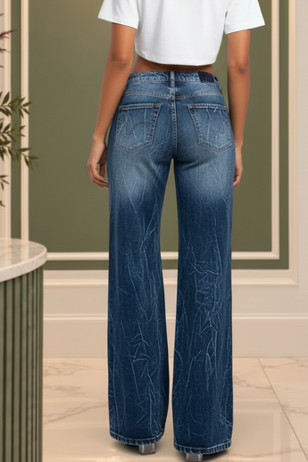 Bleu Hanger dark-wash wide-leg jeans with textured distressed finish and classic five-pocket design on a model
