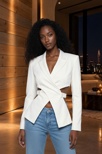 Bleu Hanger ivory tailored blazer with waist cutouts, notched lapels, and structured shoulders on a model.